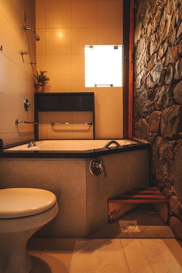 Quarto com Banheira de Hidromassagem